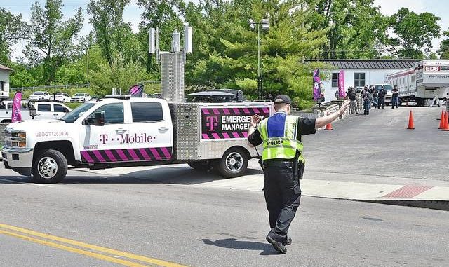 Cop clearing the way for T-mobile service at Lexington, KY